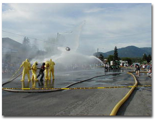 Water fight in Libby during Logger Days