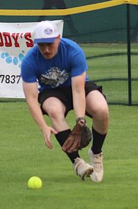 Going for a grounder at the Guns and Hoses softball game