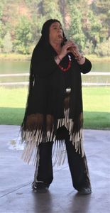 Chilaili Wachiwi plays the flute at the Kootenai Harvest Festival