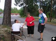 Kyle talks with the timekeepers. Photo by LibbyMT.com.