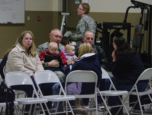 Family and soldiers. Photo by Kootenai Valley Record.