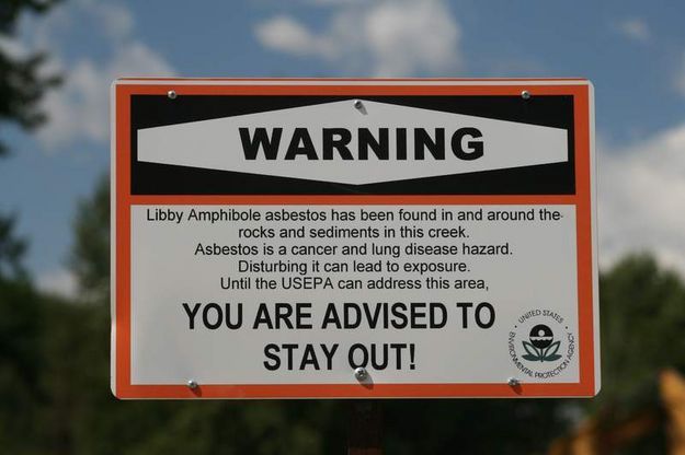Asbestos Warning Sign. Photo by Maggie Craig, LibbyMT.com.