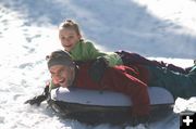 Olivia hitches a ride with dad Eric. Photo by LibbyMT.com.