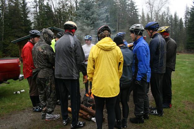 Huddling around the fire. Photo by LibbyMT.com.