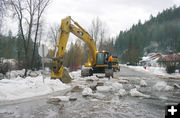 Digging out the ice. Photo by Kootenai Valley Record.