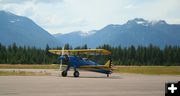 Here comes the Stearman. Photo by LibbyMT.com.