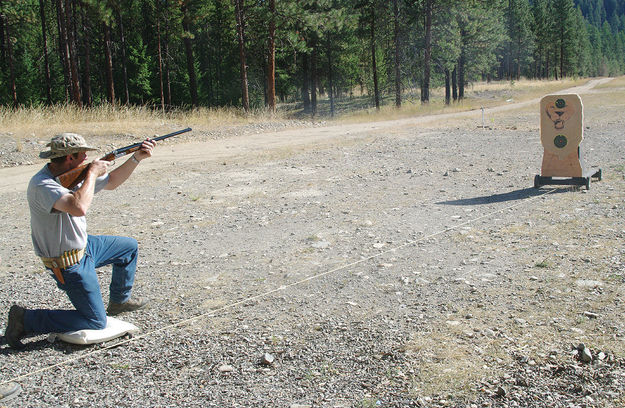 Charging lion. Photo by Kootenai Valley Record.