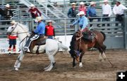 Saddle bronc Ad Bugenig reride. Photo by LibbyMT.com.