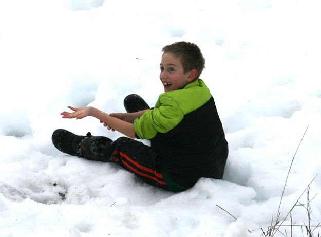 Playing in the snow. Photo by LibbyMT.com.