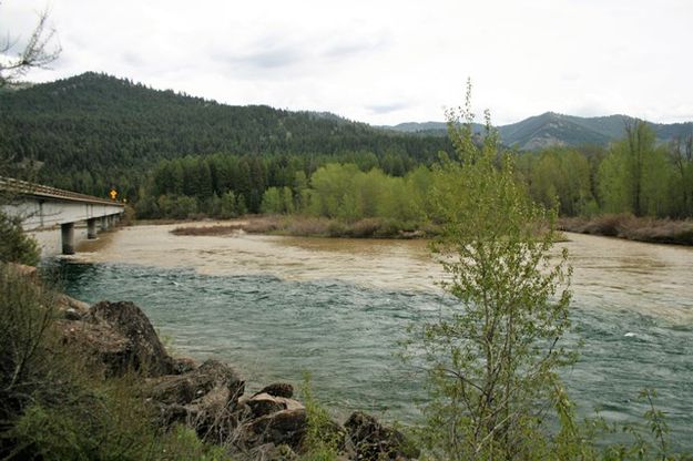 The Fisher River is high and muddy. Photo by LibbyMT.com.