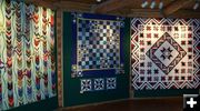 Quilt display. Photo by The Heritage Museum.
