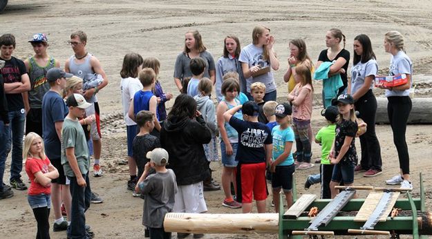 The kids gather for their logging events. Photo by LibbyMT.com.