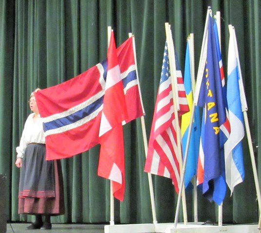 Freda shows the Norwegian flag. Photo by LibbyMT.com.