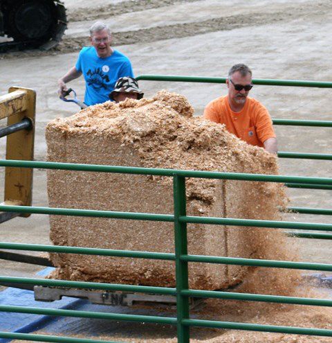 Preparing the sawdust. Photo by LibbyMT.com.