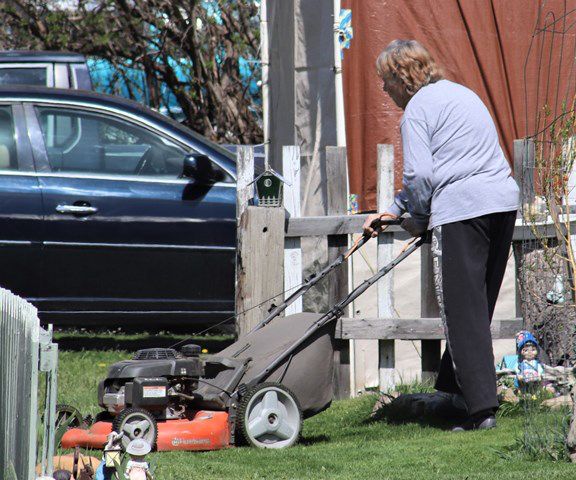 Mowing the lawn. Photo by LibbyMT.com.