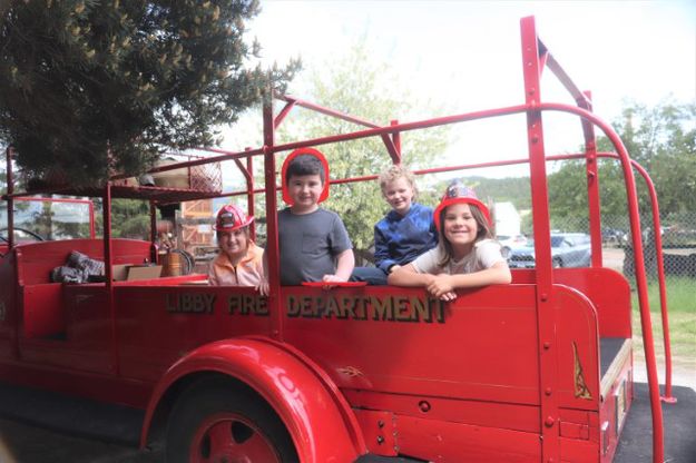 Going for a ride in the 1932 Chevrolet fire truck. Photo by LibbyMT.com.