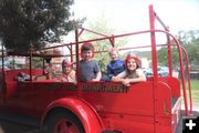 Going for a ride in the 1932 Chevrolet fire truck. Photo by LibbyMT.com.