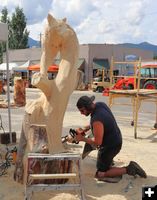 Ryan Villiers works on his carving on Friday. Photo by LibbyMT.com.