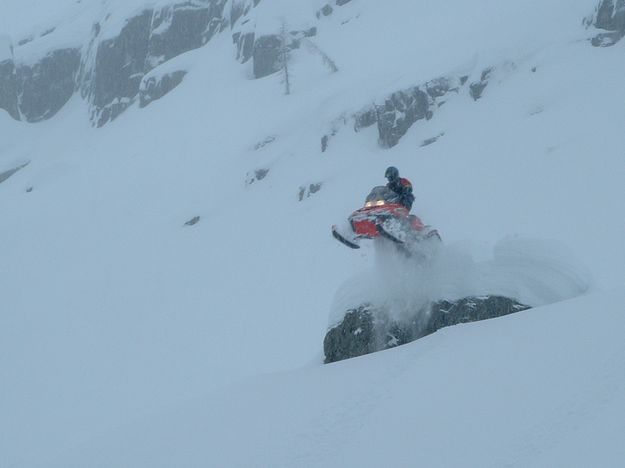 Snow rock jump. Photo by Adam Carr.